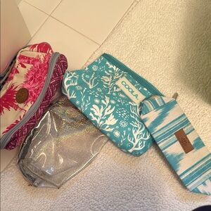 COOLA Teal and MAAJI White Bag Collection
